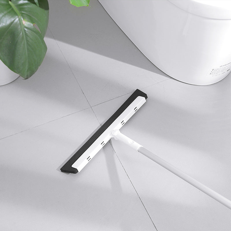 Magic mop with water squeegee on a kitchen counter