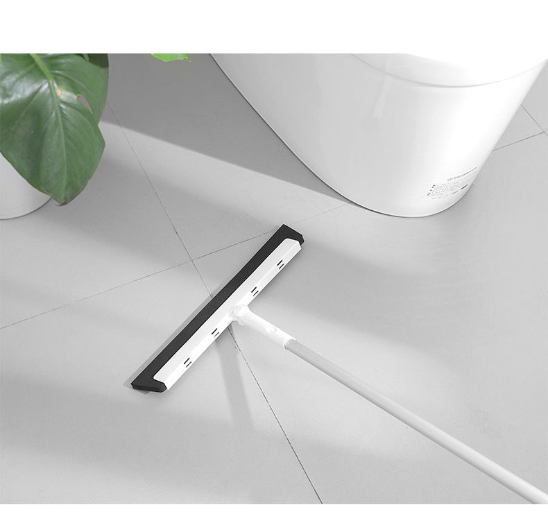 Magic mop with water squeegee on a kitchen counter