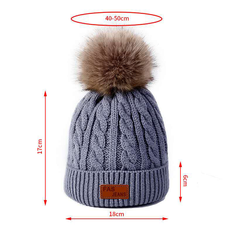 Cute children's knitted hat in red color