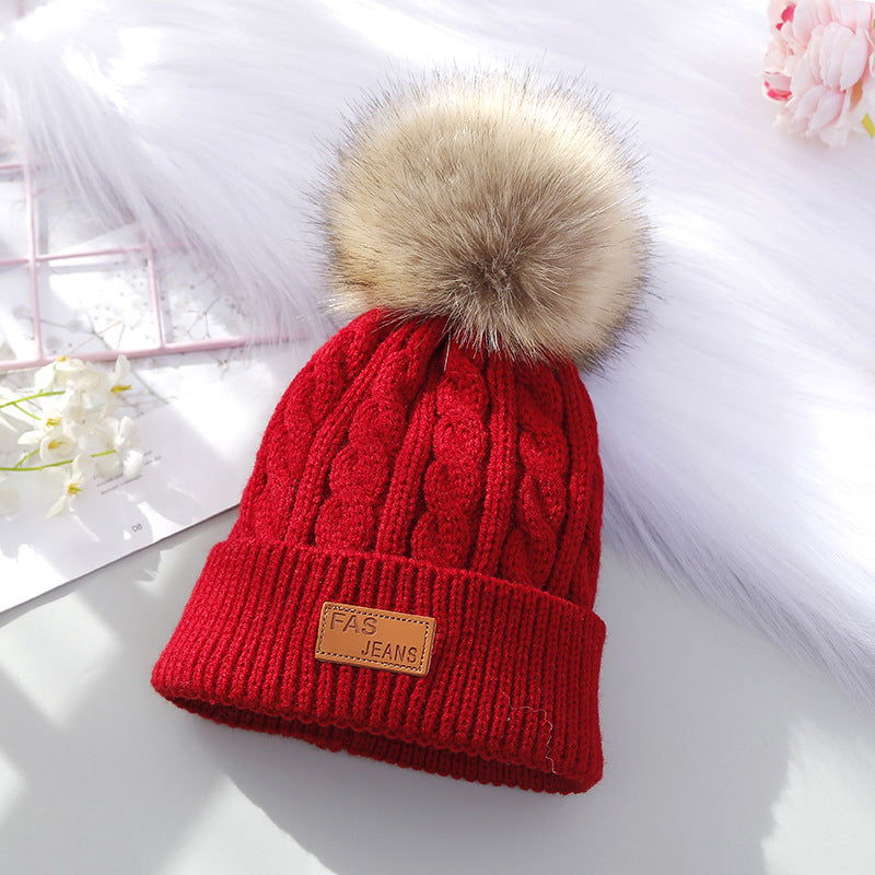 Kids pom-pom winter hat in dark blue