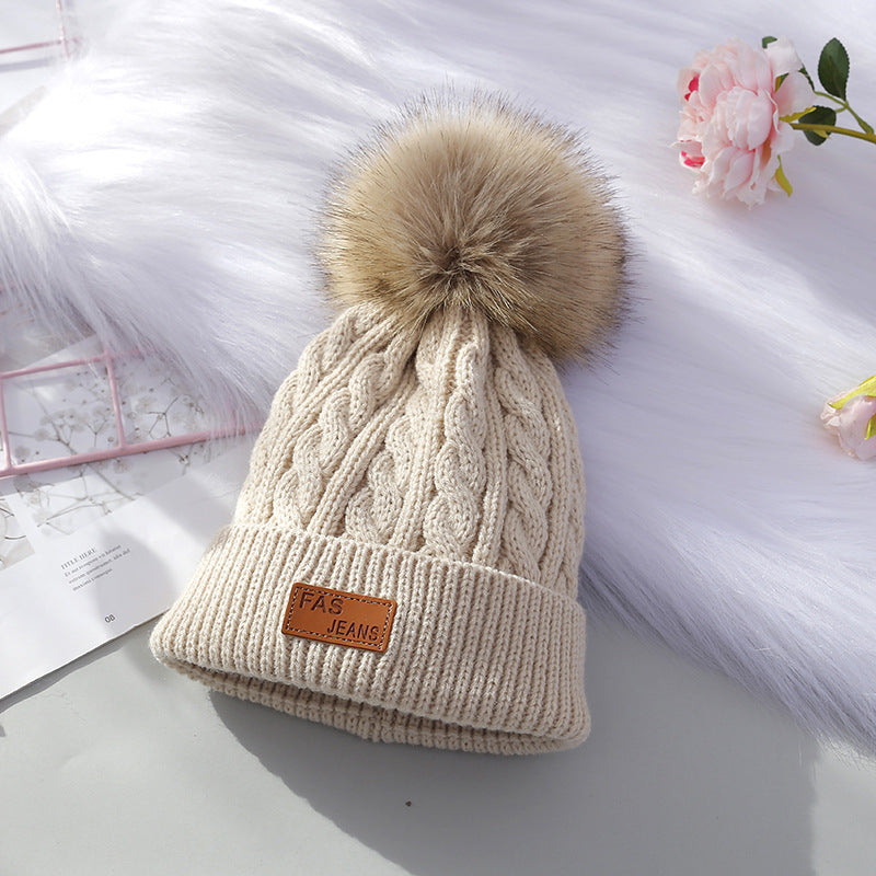 Knitted beanie hat for kids in white color