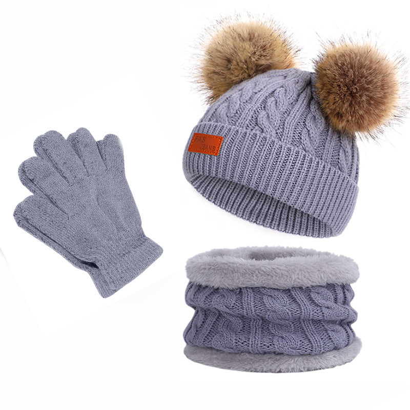 Colorful pom-pom knit hat for children