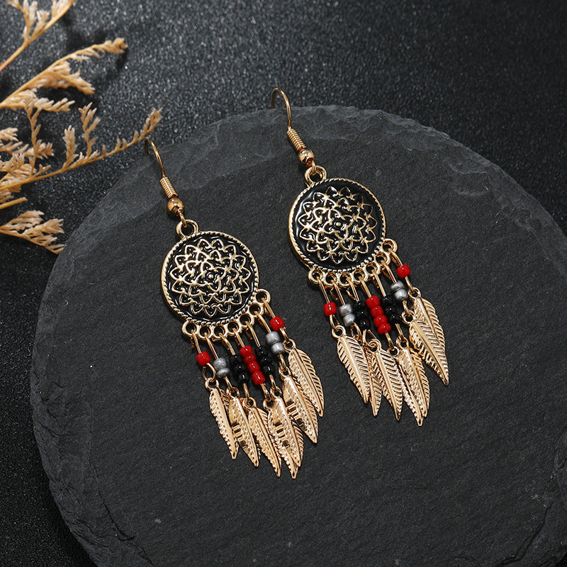 Bohemian dreamcatcher tassel earrings gold
