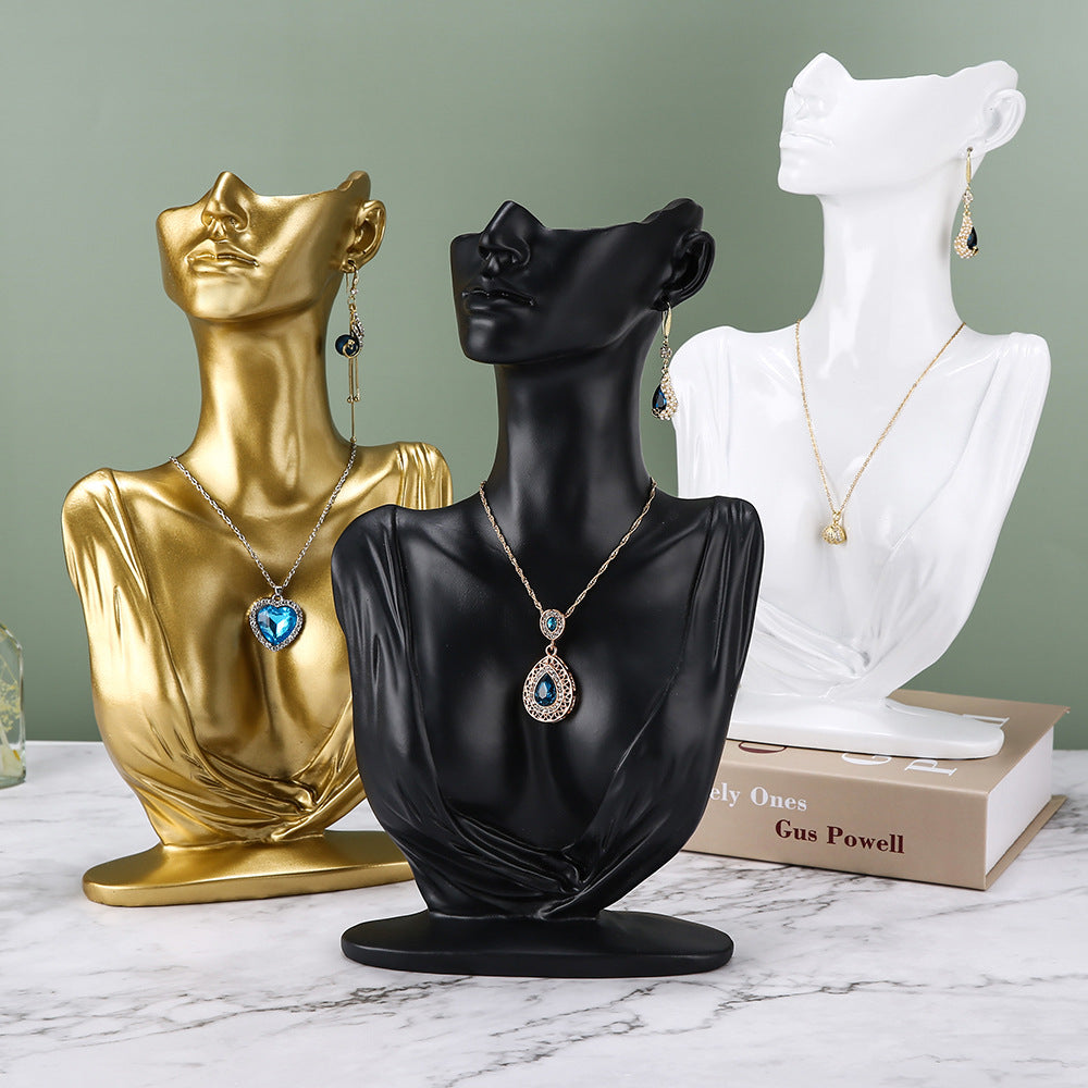 resin figure jewelry stand minimalistic design