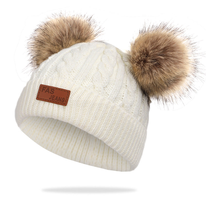 Colorful pom-pom knit hat for children