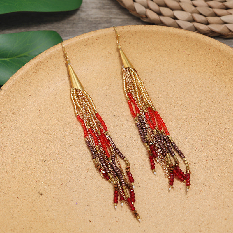 Colorful ethnic earrings displayed elegantly image 4