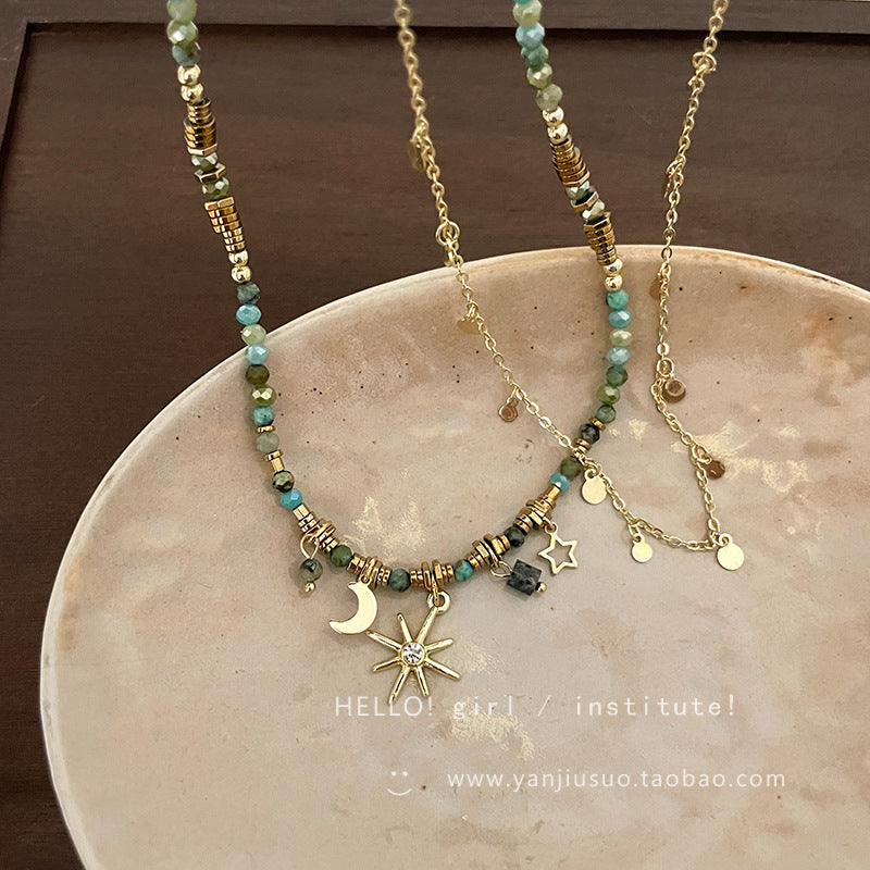 Necklace worn with winter fashion outfit