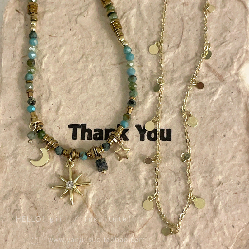 Close-up view of the floral pendant necklace