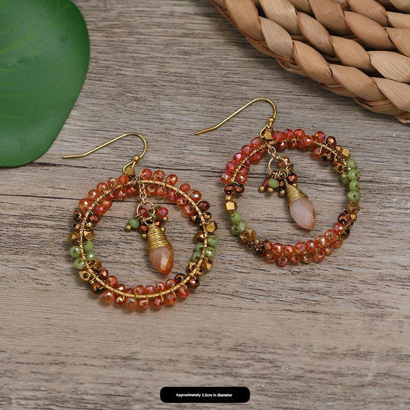 Wearing bohemian tassel earrings outdoors image 5
