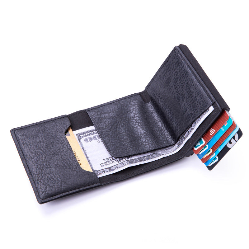 Aluminum wallet in hand for size comparison