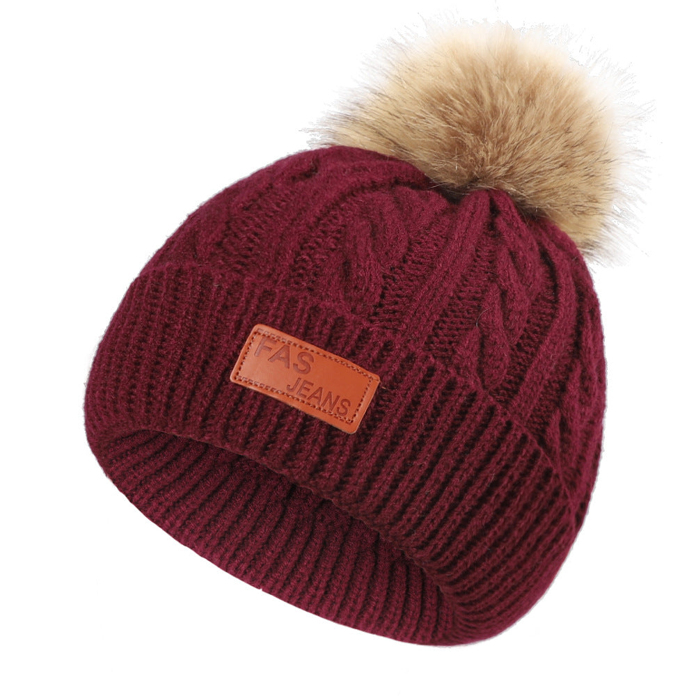Colorful pom-pom knit hat for children