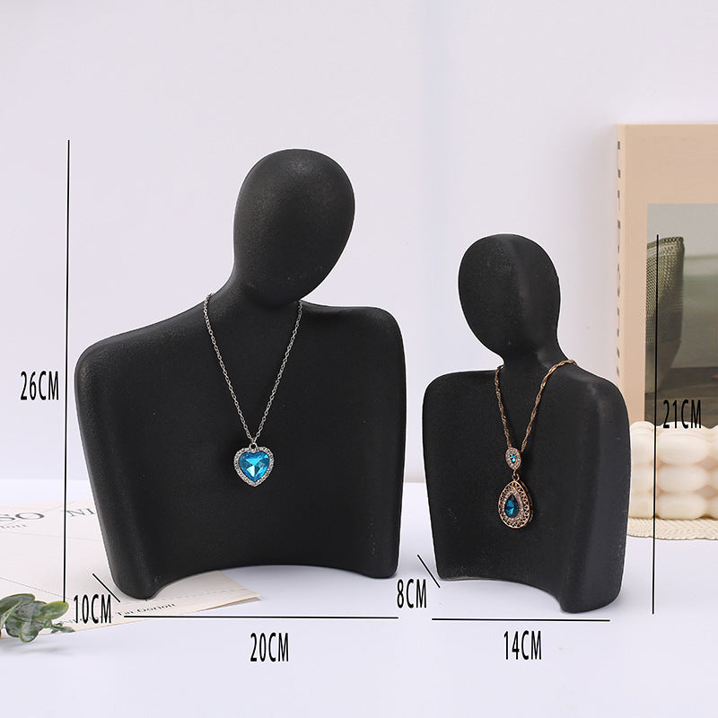 resin figure jewelry stand minimalistic design