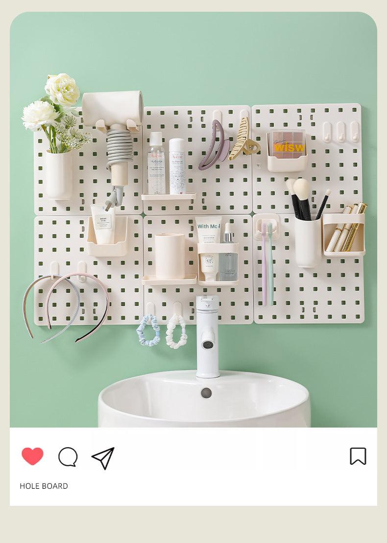 Image of wall-mounted pegboard organizer with various compartments