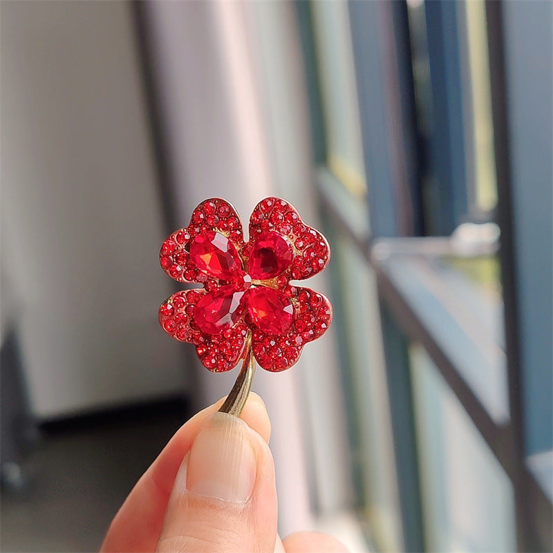 Sleek cat eye stone brooch