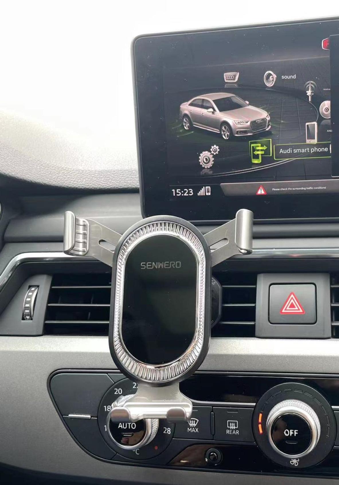 Car phone holder in use for hands-free navigation