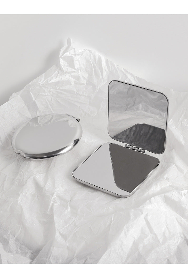 Compact Dual-Sided Folding Makeup Mirror - Image 1