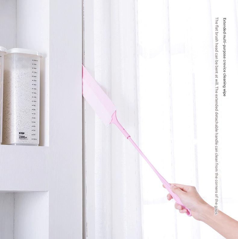 Using the Gap Dust Brush under furniture
