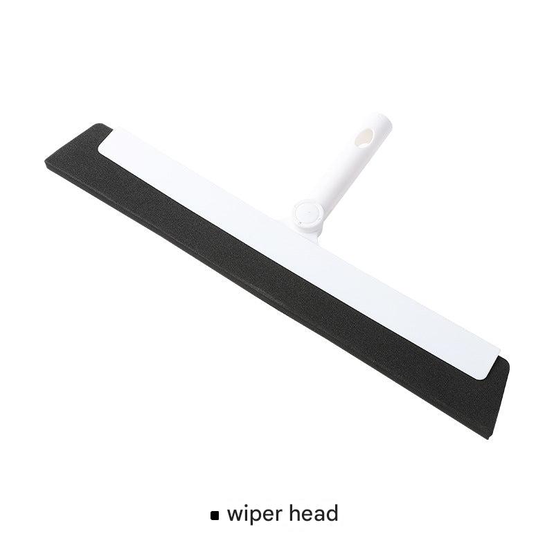 Magic mop with water squeegee on a kitchen counter