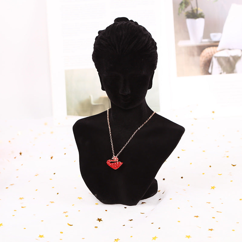 sophisticated white mannequin jewelry stand