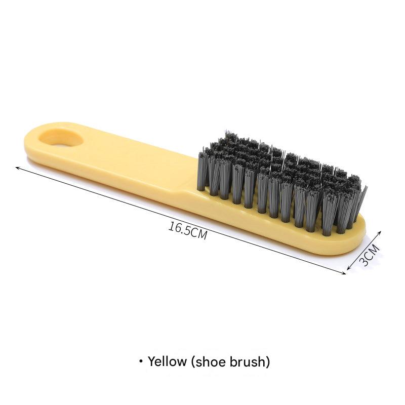 Yellow cleaning brush for laundry and shoes