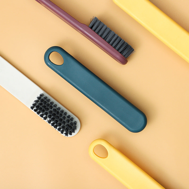 Yellow cleaning brush for laundry and shoes