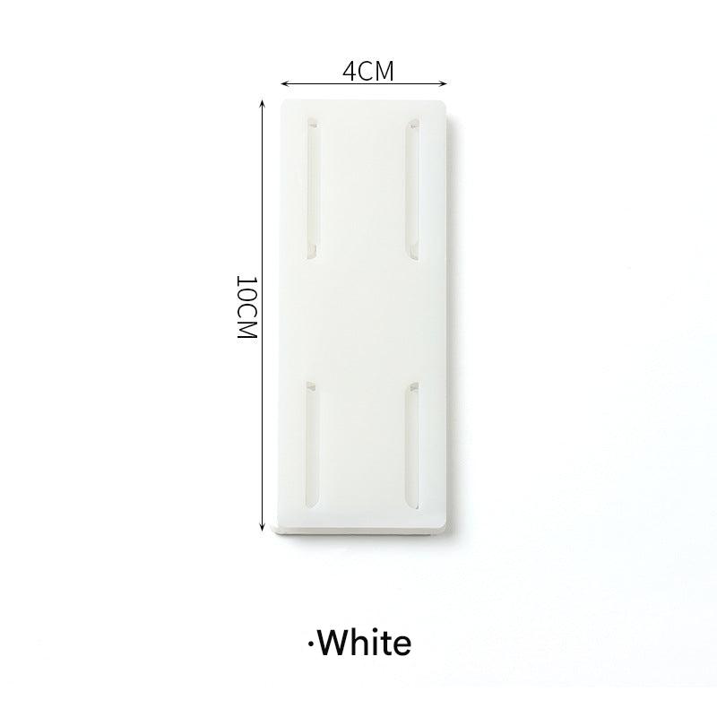 Wall-mounted power strip organizer in green