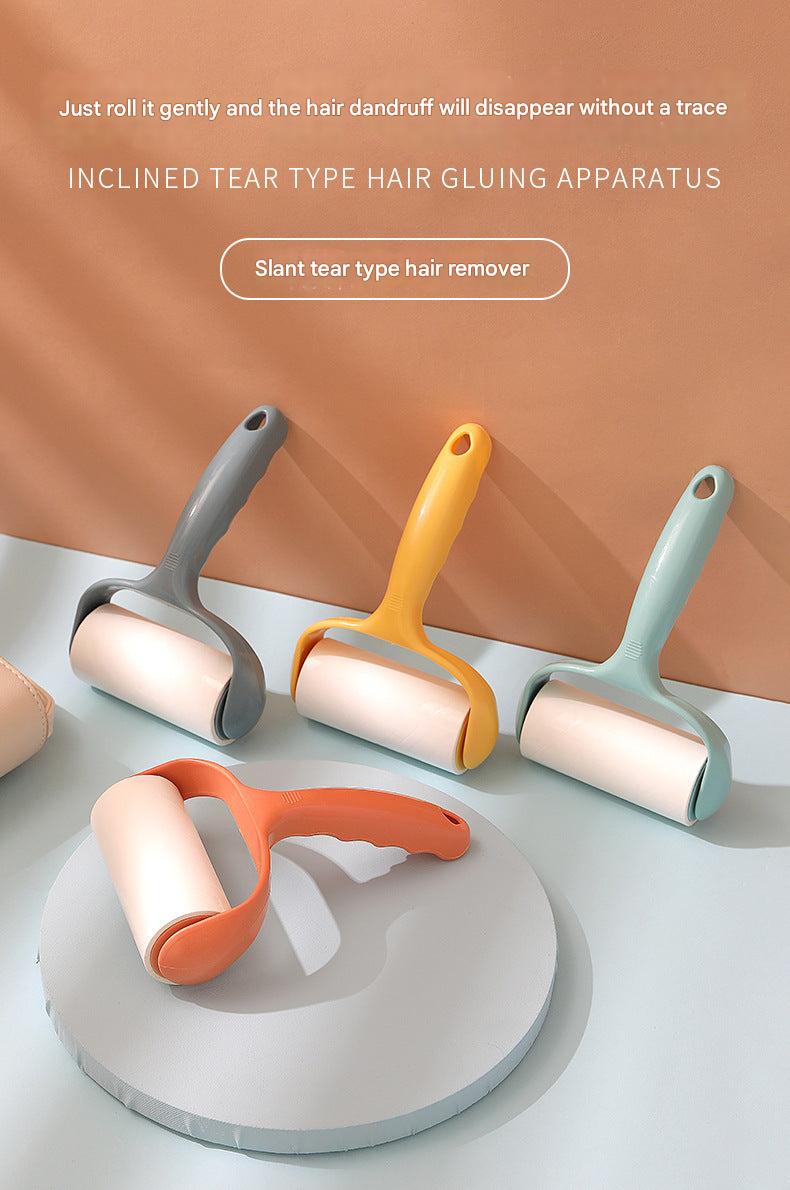 demonstration of using lint roller on fabric surface