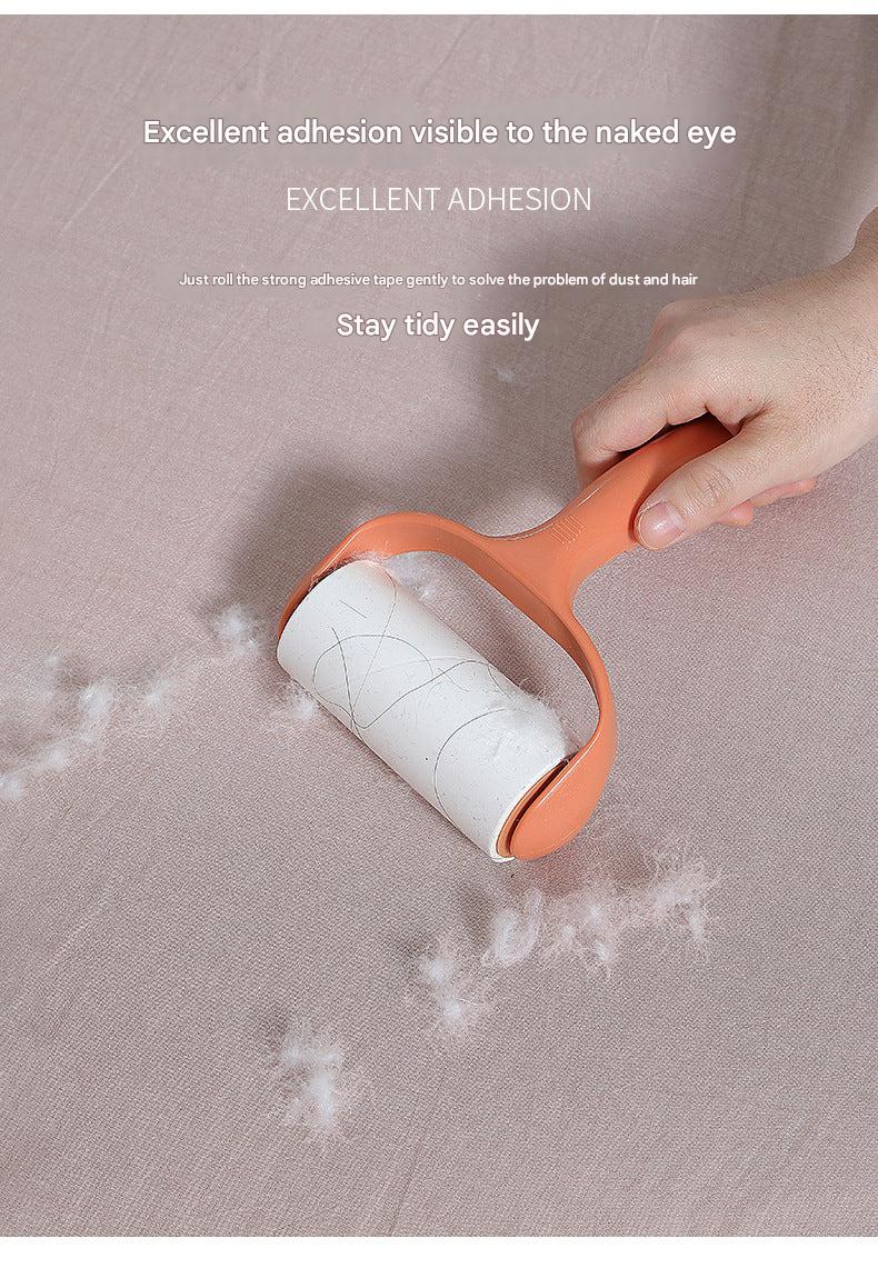 lint roller used on clothes with visible lint removal