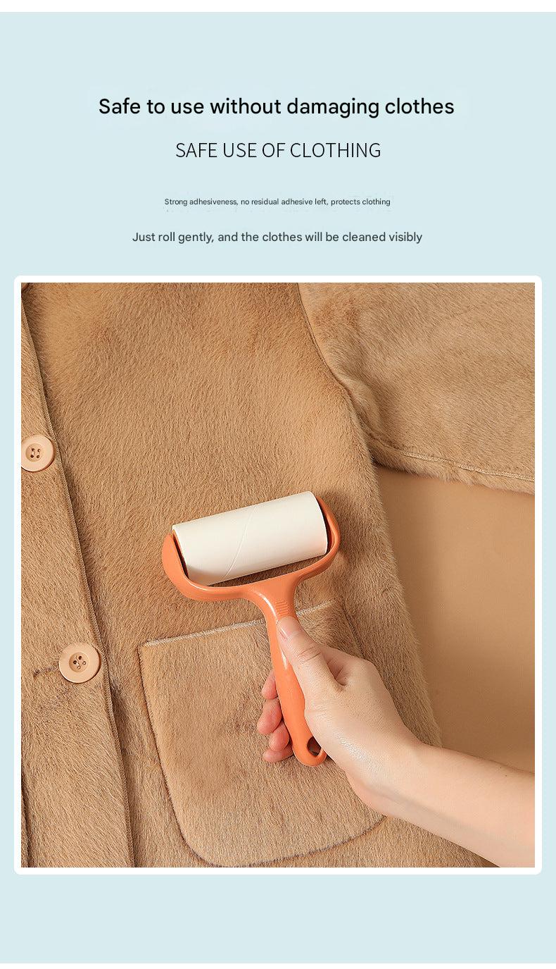 user pulling strip from lint roller