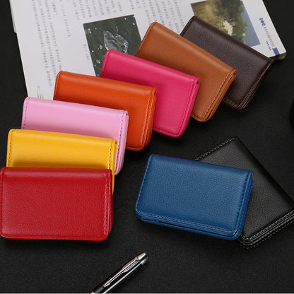 Business card holder with magnetic closure