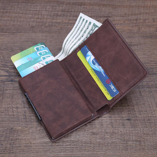 Automatic pop-up credit card holder