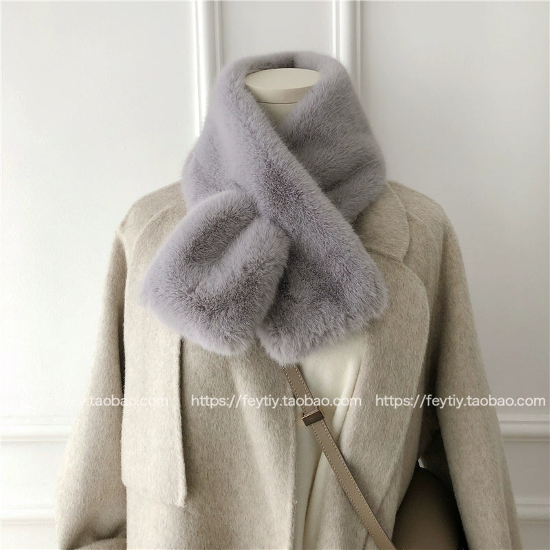 cozy neck warmer displayed on mannequin