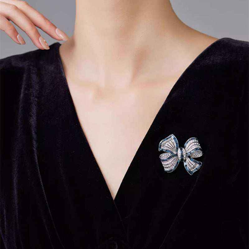 Silver Butterfly Knot Brooch in Packaging
