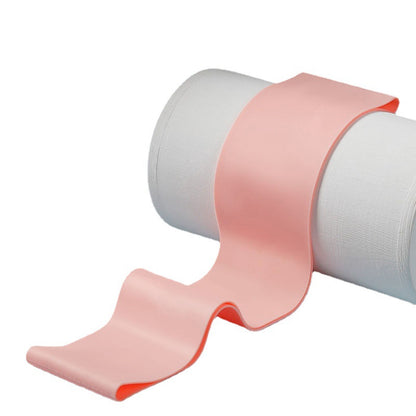 user performing yoga with resistance band