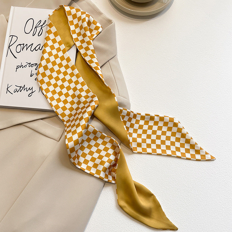 Close-up of multi-functional yellow scarf