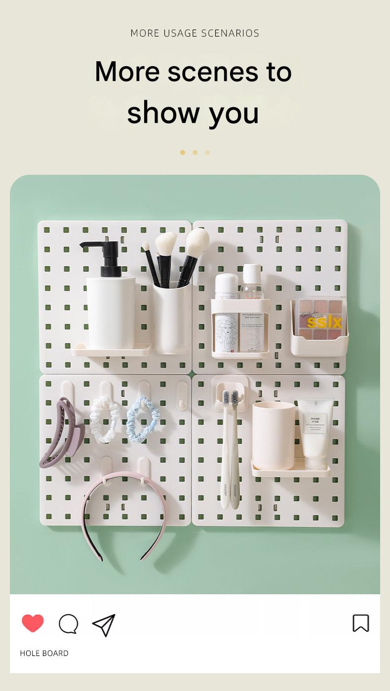 Dorm room setup with pegboard organizer