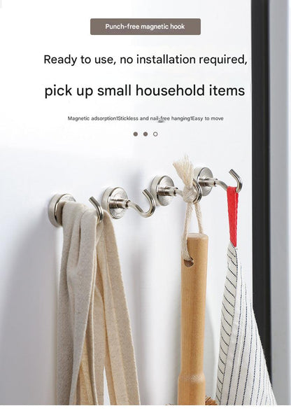 Magnetic hook holding kitchen utensils