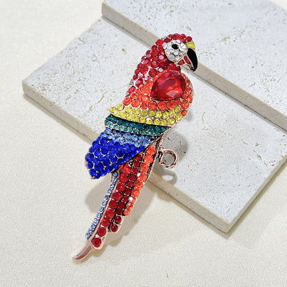 Vintage parrot brooch on a jacket