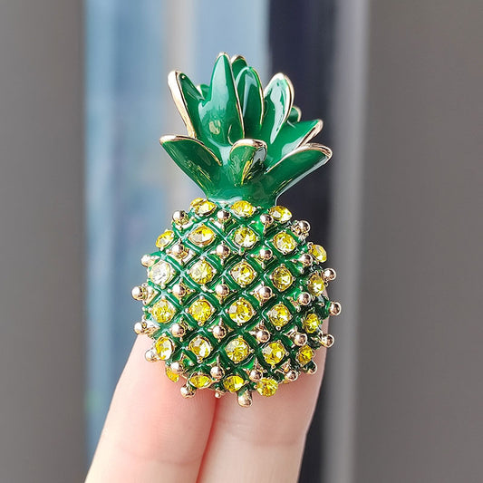 Pineapple brooch collection display