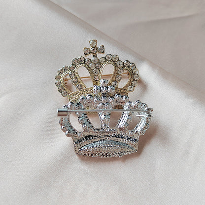 Detailed close-up of rhinestone crown pin