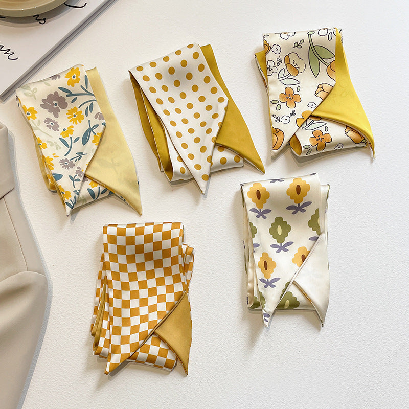 Close-up of multi-functional yellow scarf