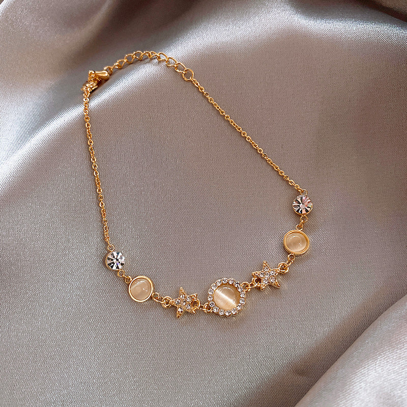 Stylish star-shaped cat eye stone bracelet for women