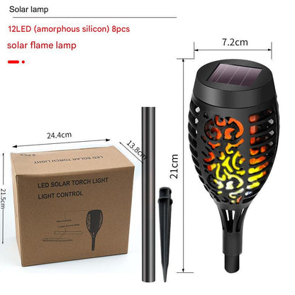 Solar-powered outdoor yard light with flickering effect