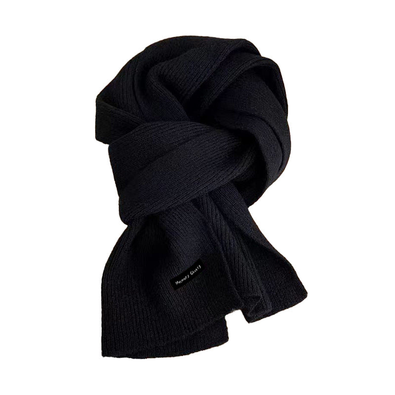 Elegant black knitted scarf