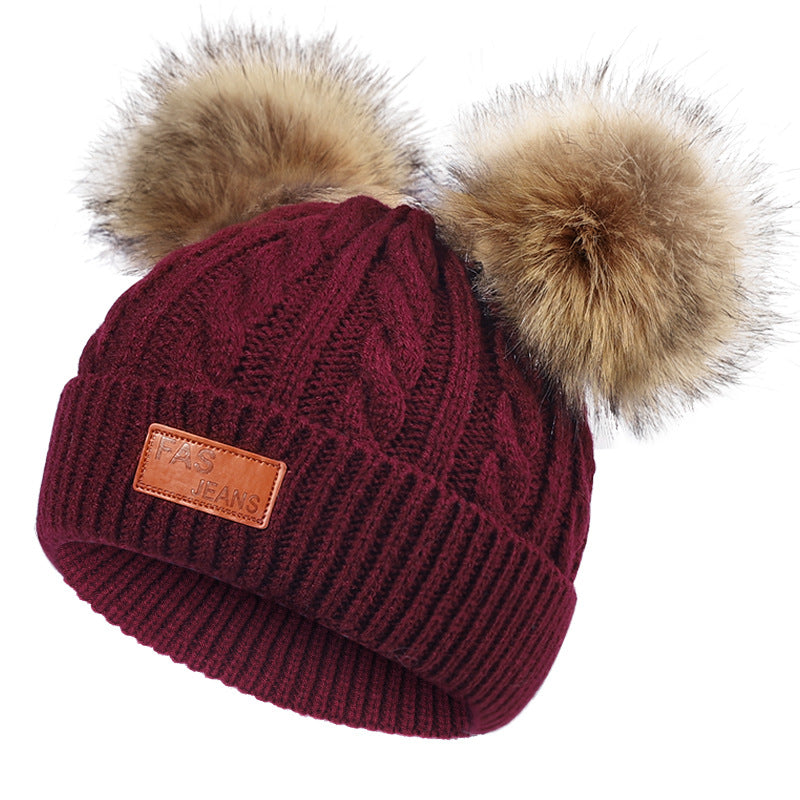 Colorful pom-pom knit hat for children