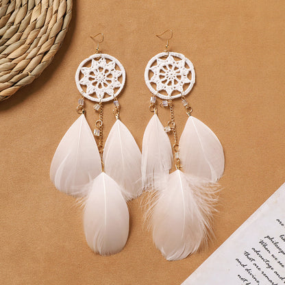 Different style variations of feather earrings