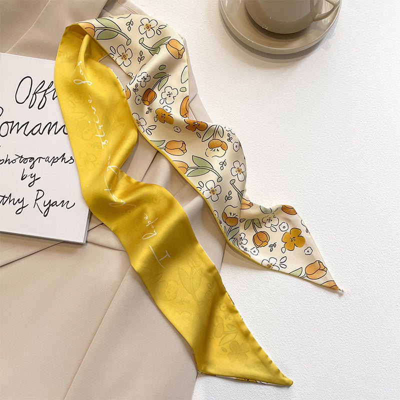 Yellow scarf displaying floral designs