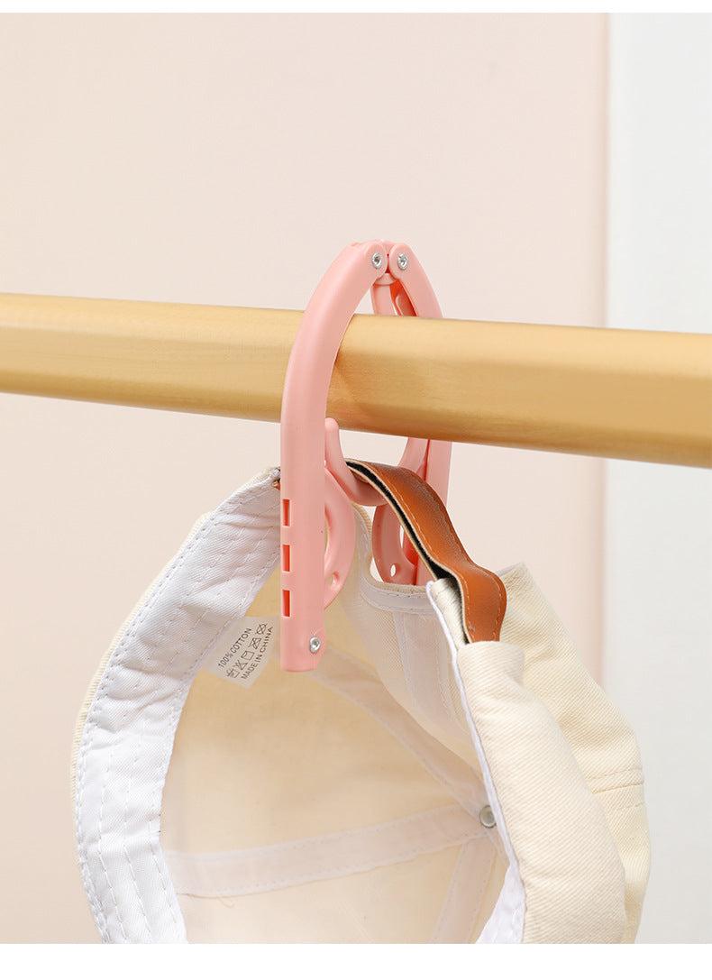 Portable multi-use hanger displaying socks image 2