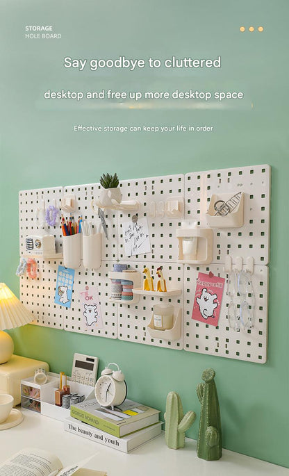 Dorm room setup with pegboard organizer
