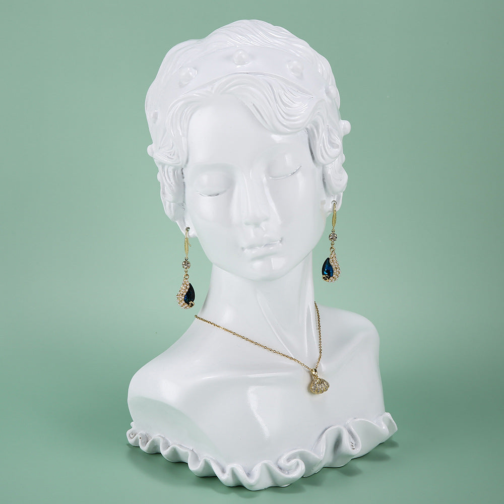 resin figure jewelry stand minimalistic design